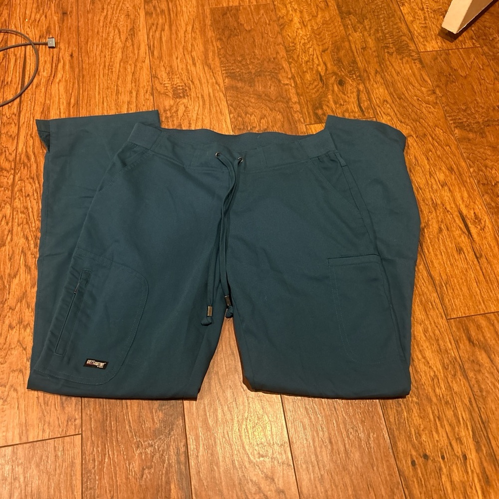 Small teal scrub pants